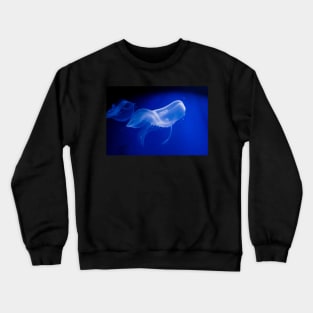 Translucent jellyfish in deep blue water Crewneck Sweatshirt